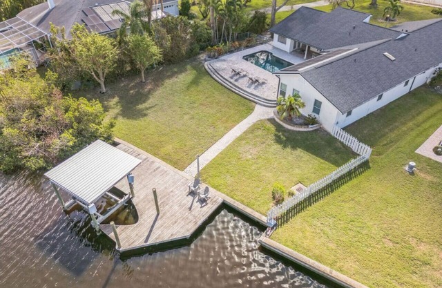 456) Stunning Canal-Front Home with Heated Pool!