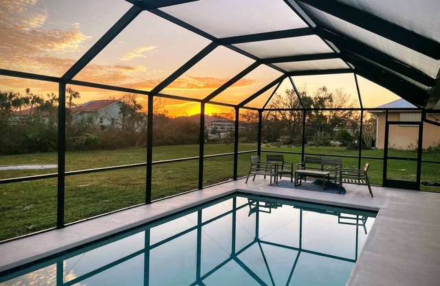 Canal home, heated pool, close to everything!!