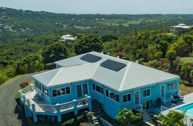 Caribbean Camelot! Embrace your royal status as you relax in this castle-like retreat!