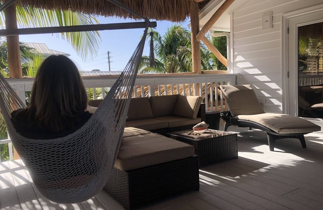 Offre spéciale - Nouveau! Passerelle vers Palm Island. Caribbean Tiki Hut Residence