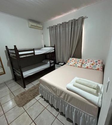 Casa aconchego - área de piscina e churrasqueira