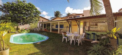 Casa com piscina na Praia de Cotovelo by Qavi