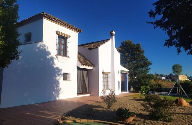 Casa con jardin