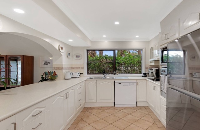 Casa Culburra - mid-century modern style retreat with fireplace, swimming pool, and billiard table