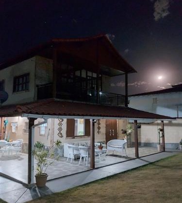 Casa em frente a praia de Jaconé