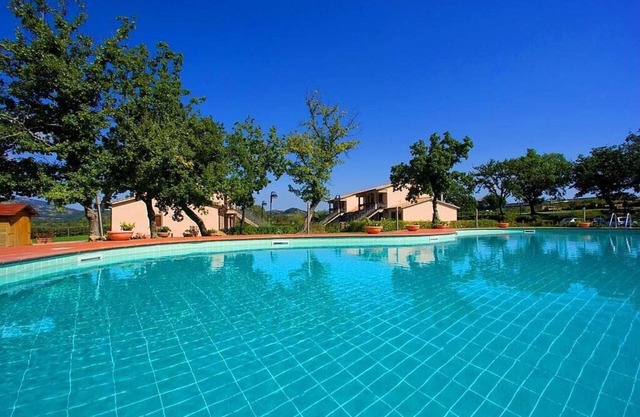 Casa Pegaso A: Un appartement confortable situé dans une région vallonnée.
