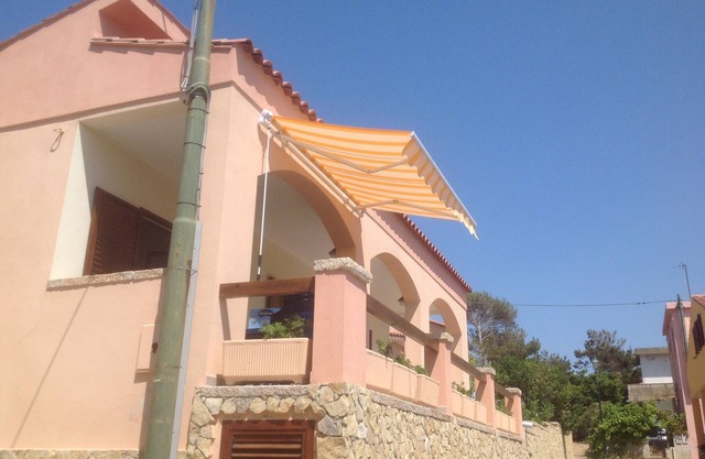 Casa Valentina (Loc. Porto Palma) avec véranda et jardin, au mt. 150 de la plage