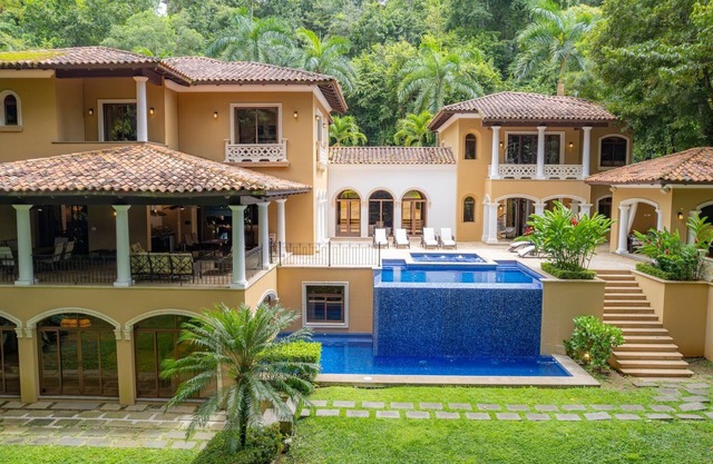 7-Bedroom Luxury Villa with Private Pools, Game Room & Resort Access