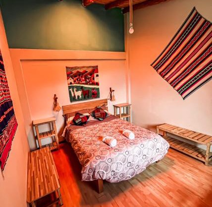 Casita con cocina privada, patio y jardin