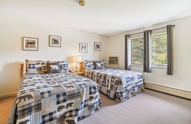 Chambre standard avec deux lits doubles