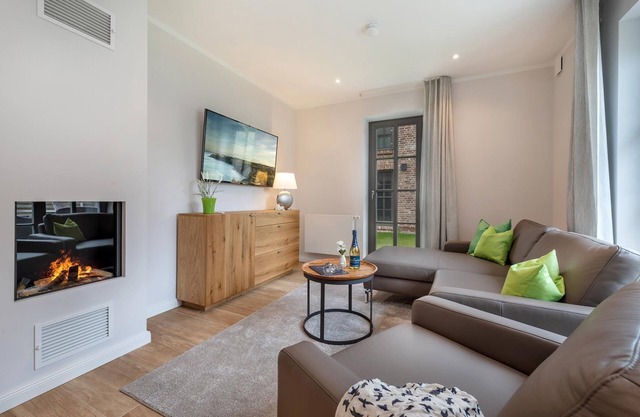 Central newly built vacation apartment with gas fireplace near the beach for 4 pers.