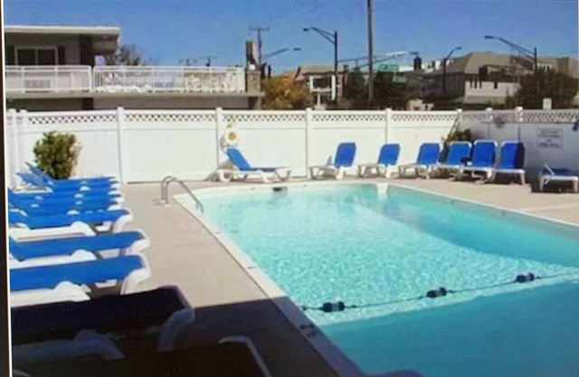 Central Location -- Short walk to Beach/Boardwalk w/ parking and heated pool!