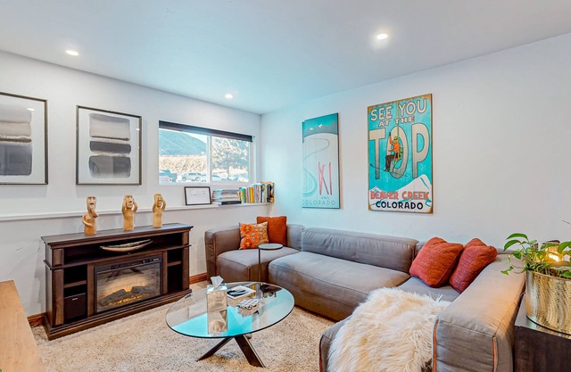 Centrally located condo with office, fireplace, W/D, & ski closet