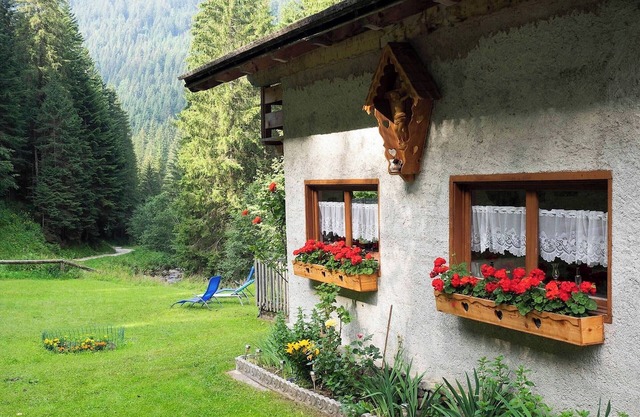 Chalet 'Baita Florinda' avec vue sur les montagnes, jardin et Wi-Fi
