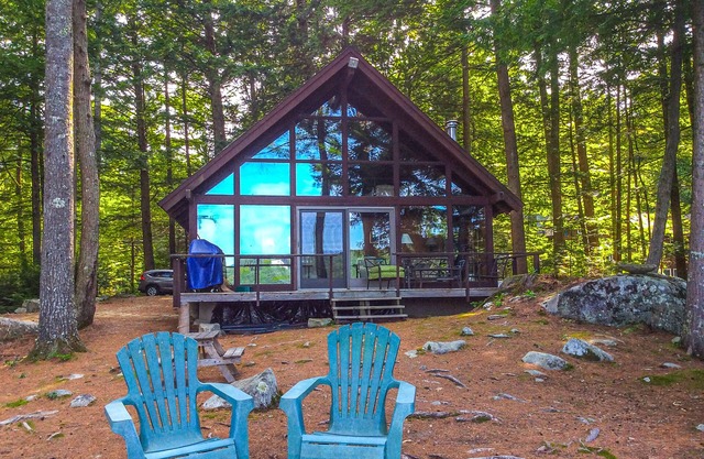 Chalet-style lakefront home with private dock, beach, kayak, canoe & epic view