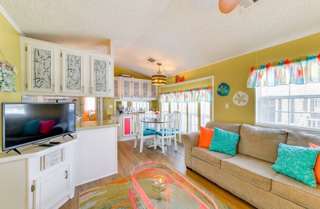 Charming 2-bedroom resort home minutes from the beaches with heated pools.