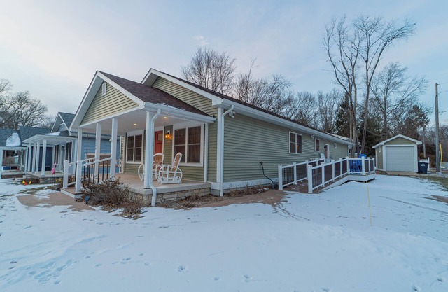 Charming 3-bedroom house in Michigan City is handicapp accessible with ramp.