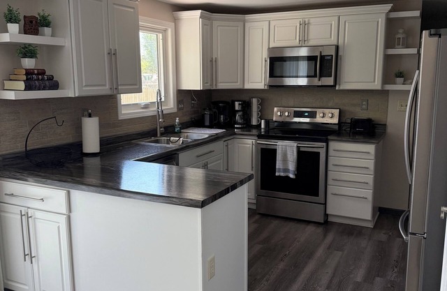 Charming 3 Bedroom 2.5 bathroom finished basement, Huge yard and Charcoal grill