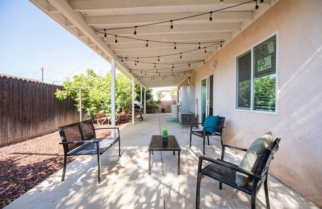 Charming 3-BR Home with Backyard Paradise: BBQ, High-Speed Internet, and Parking Included