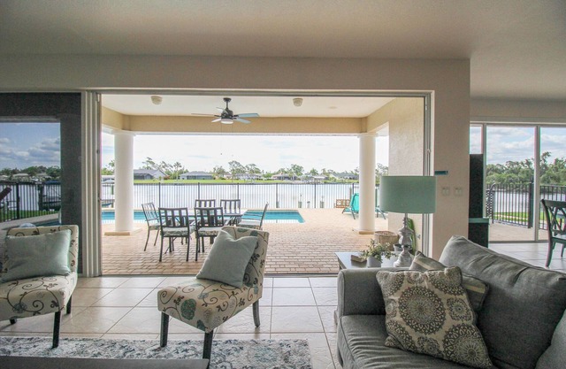 Charming 4-BR Waterfront Pool Home With Dockage