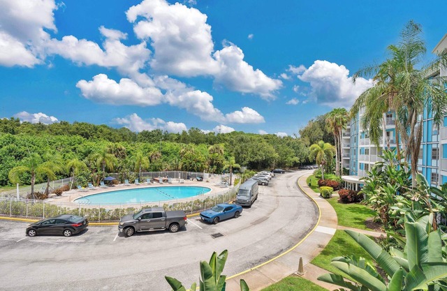 Charming Apartment with Balcony & Pool Views