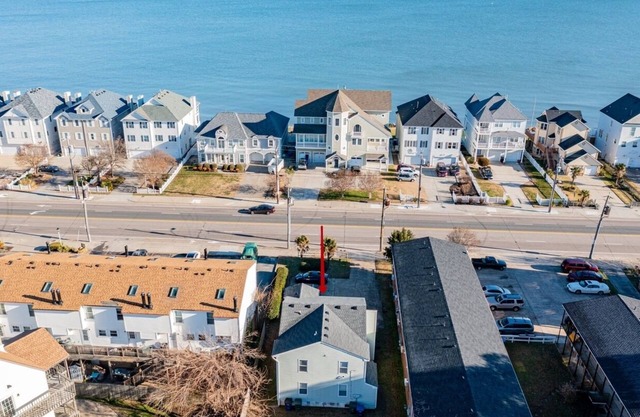 Charming Beachside Duplex: 2 Units -3 Bedrooms-each. Ideal for large families
