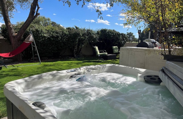 Charming Casita with a fireplace, and a private patio and golf course views.