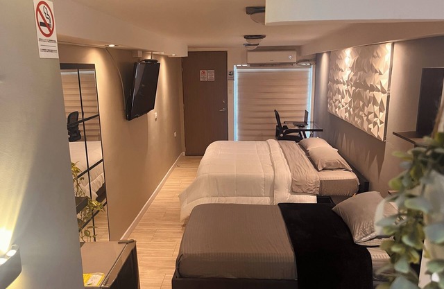 Charming deluxe studio with WiFi, AC, Kitchen, and Workstation in Barranquilla