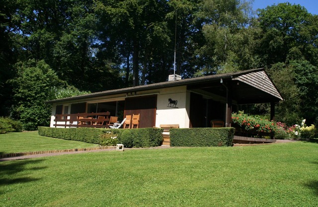 Maison avec terrasse et grand jardin boisé dans domaine résidentiel privé