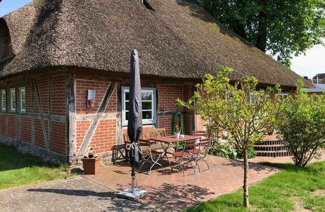 Charmant toit de chaume historique près de Lübeck et de la mer Baltique