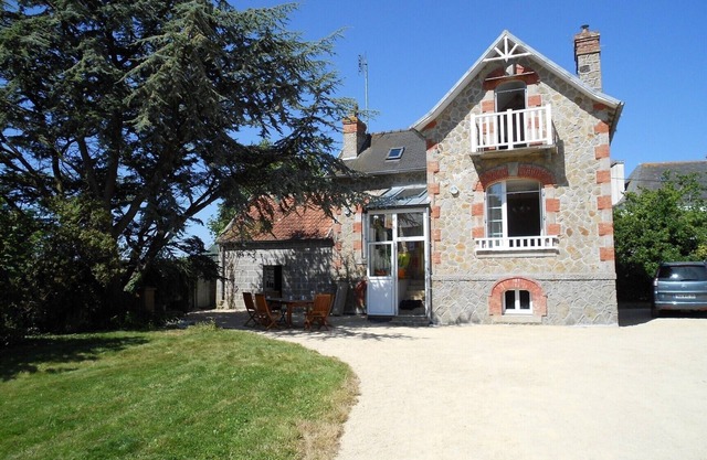 Charmante maison de vacances avec grand jardin à proximité des plages.