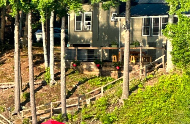 Charming lakefront family Cottage w/ hot tub and fire pit!