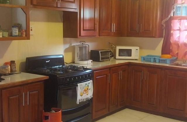 Charming Piarco Home With Garden View