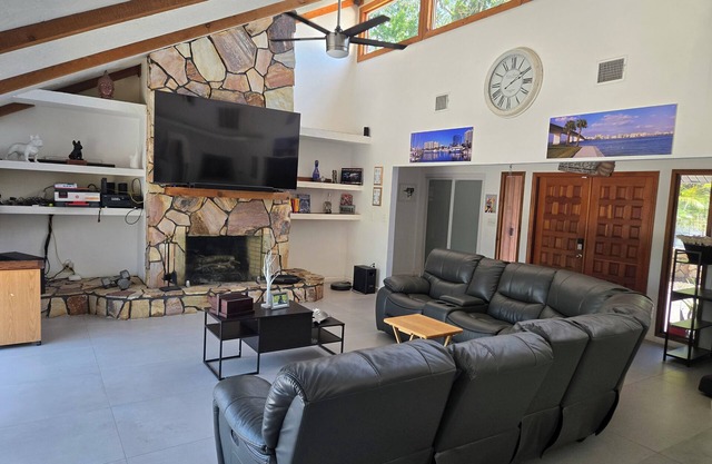 Charming private 4-bedroom estate on over 1 acre of land.