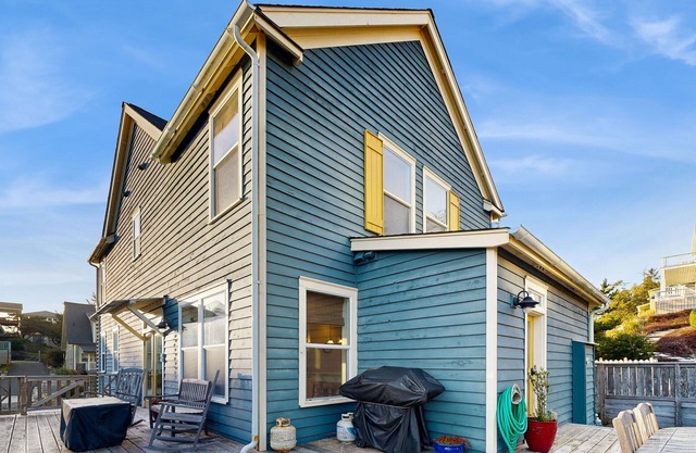 Charming, two-story home with a private hot tub, large patio, & washer/dryer