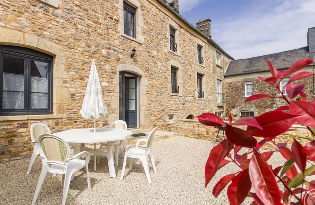 Charming Village House with Terrace - 3 Bedrooms, Modern Amenities, and Parking