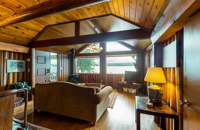 Charming waterfront home with full kitchen, furnished deck, & incredible views