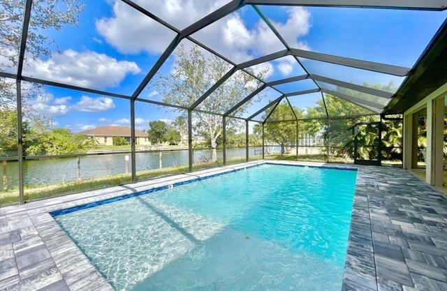 Charming Waterfront Oasis - Heated Pool & Arcade Games