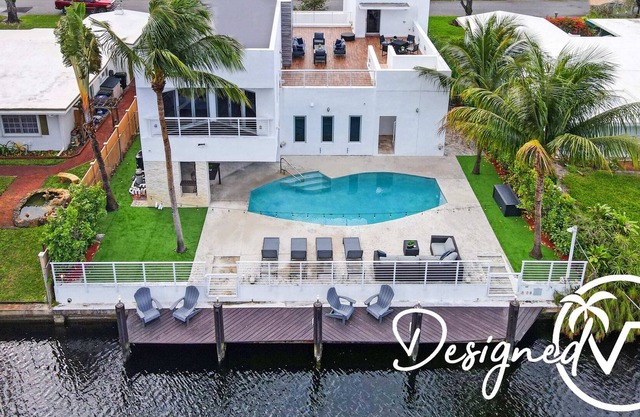 Chic 6 BR Home w/ Heated POOL, Game Room + Rooftop