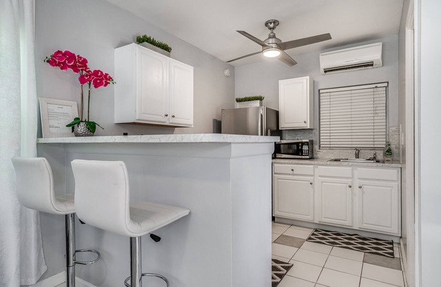 Maison d'hôtes chic Palm Beach Cove avec jardin zen