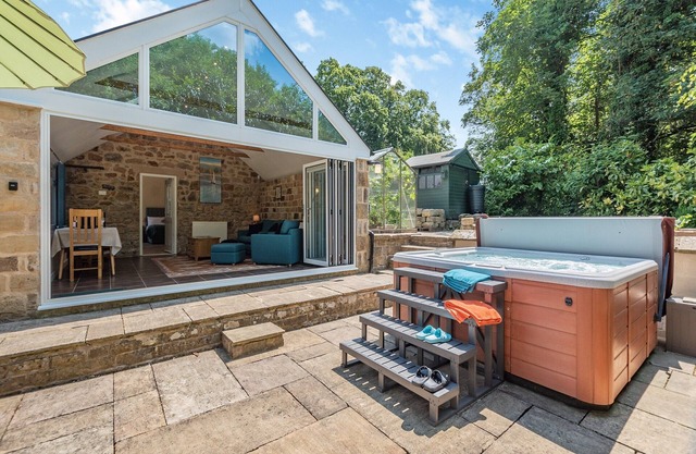 Church Cottage nestles in the grounds of the Old Vicarage in Darley Bridge.