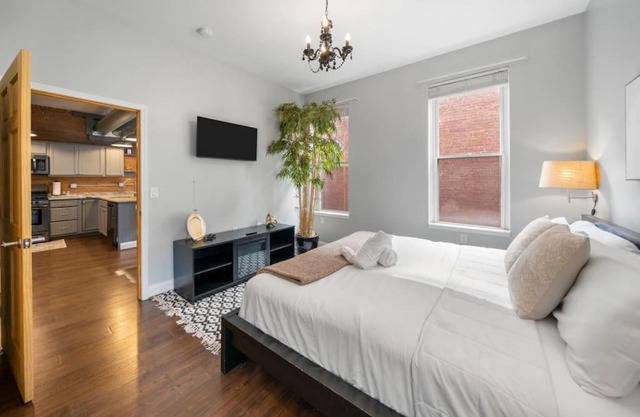 City Escape 2BR Steps to TQL near OTR and Downtown