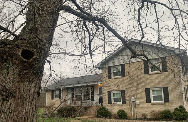 Classic 1970s split level on three acres in beautiful Arrington