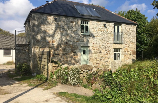Grange de granit détachée de luxe dans une petite ferme près du pont Mylor.