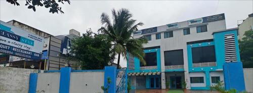 Classy Stay Log Inn Plaza near EON IT PARK Rooms Banquet Restaurant & Bar
