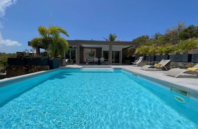 Come and enjoy this brand new home with private pool located in Terres Basses.