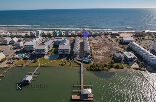 Coastal chic beach home in Cottages at Lagoon Pass with EV charger and pool.