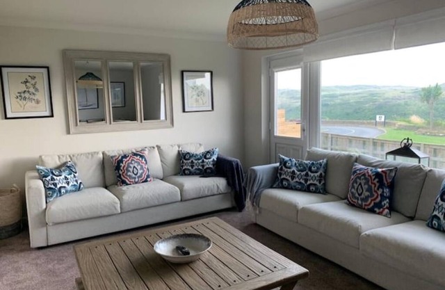 Coastal family home a stones throw from the beach.