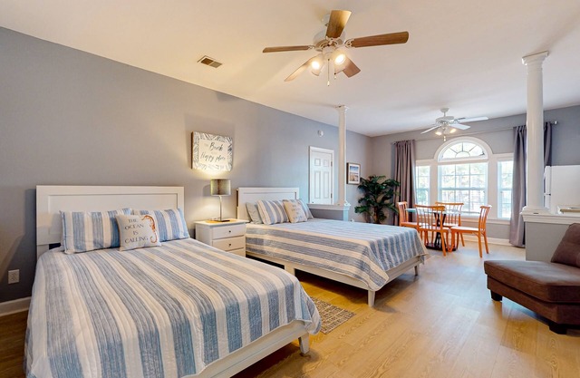 Coastal Suite with golf course view and shared pool access