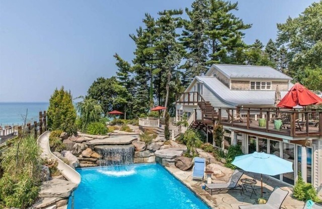 Colossal Union Pier Home with Lakefront, Pool, Hot Tub and More!